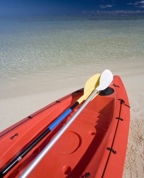 Canoe on a tropical beach in the Maldives in the Indian Ocean.