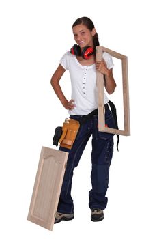 Girl with picture frame on shoulder