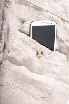 A Smartphone on some dark cloth.