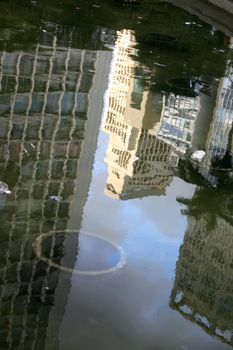 Reflection of Buildings in a Fountain in Downtown Sao Paulo, Brazil, South america.