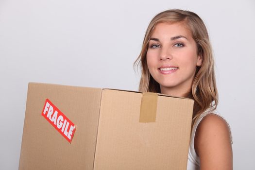 Young woman with a cardboard