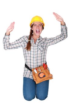 A female manual worker trapped in a box.