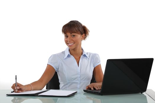 businesswoman working at her desk