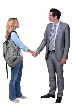 girl shaking hand with man