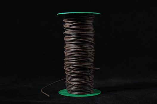 Roll of Twine isolated on a Black Background