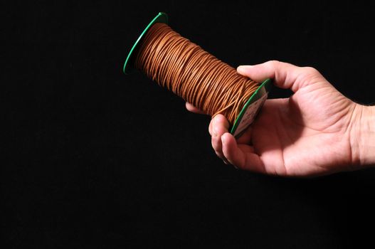 Roll of Twine isolated on a Black Background