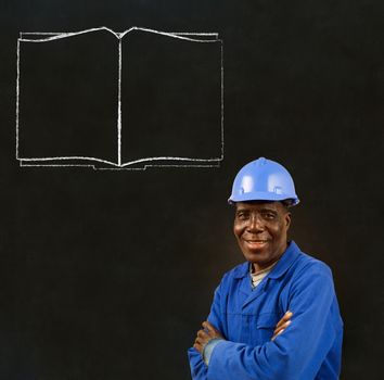 African American black man worker with chalk open book on a blackboard background
