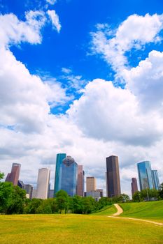Houston Texas Skyline with modern skyscapers and blue sky view from park lawn