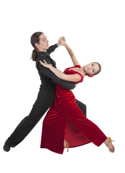 Young couple dancing waltz isolated over white background