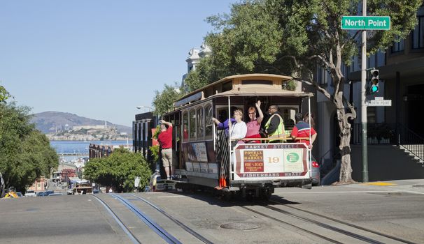 SAN FRANCISCO - NOVEMBER 3: The Cable car tram, November 3rd, 2012 in San Francisco, USA. The San Francisco cable car system is world last permanently manually operated cable car system. Lines were established between 1873 and 1890.