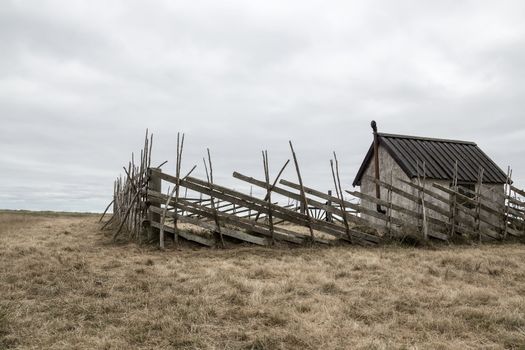 Old farmhouse in the field. Island of Gotland, Sweden.