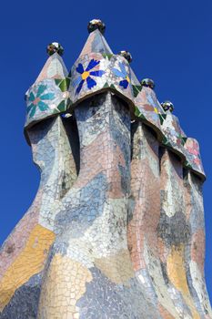 Gaudi chimney on the roof of Casa Batllo in the Eixample district of Barcelona in the Catalonia region of Spain.