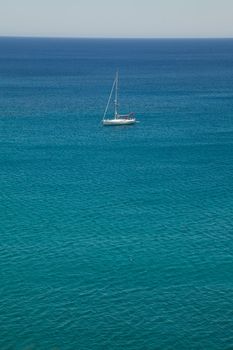 White sailing ship yacht in Mediterranean Sea, Crete island, Greece 