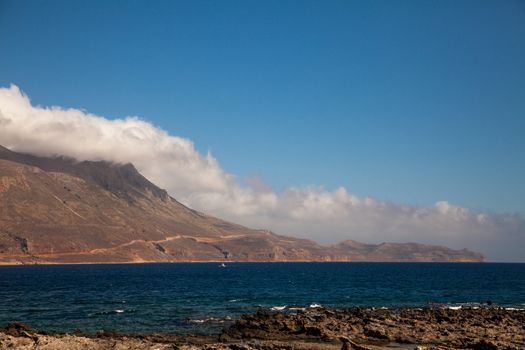 Mountain with clouds and sea view, Crete, Greece 