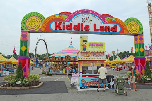 INDIANAPOLIS, INDIANA - AUGUST 19: Entrance to Kiddie Land and rides on the Midway of the Indiana State Fair on August 19, 2011. This very popular fair hosts more than 850,000 people every August.