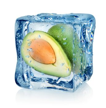 Avocado in ice cube isolated on a white background