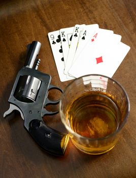 winning hand with two pairs and a gun for a deadly poker game