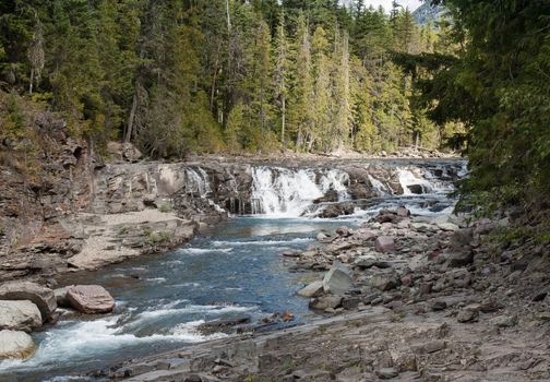 Small waterfalls and rapids are seen in this image from Glacier National Park.