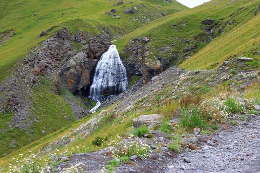 Waterfall Girlish Braids between the mountains of Northern Caucas