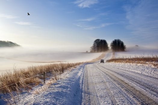 Winter driving on a country road in North Yorkshire in the United Kingdom.