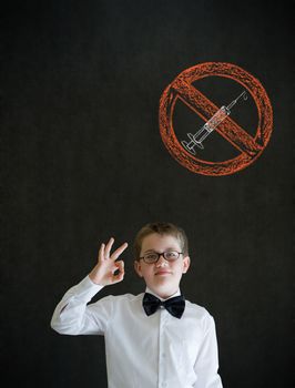 All ok or okay sign boy dressed up as business man with no drugs needle sign on blackboard background