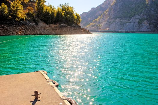 Mountain Lake. Emerald water reservoir behind the dam Oymapinar