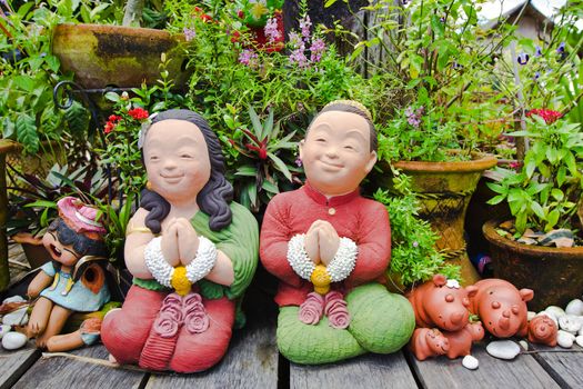 Terra cotta in characteristic of Thai traditional doll