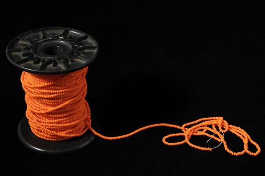 Roll of Twine isolated on a Black Background