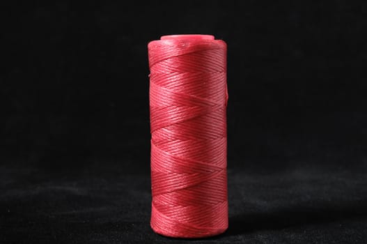 Roll of Twine isolated on a Black Background