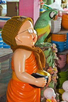 Terra cotta in characteristic of Thai traditional doll