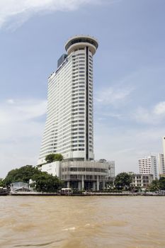 BANGKOK, THAILAND- SEP 25TH: The Hilton Millenium hotel on the Chao Phraya river, Bangkok on September 25th 2012. Founded in 1919, Hilton has more than 550 hotels across 6 continents.