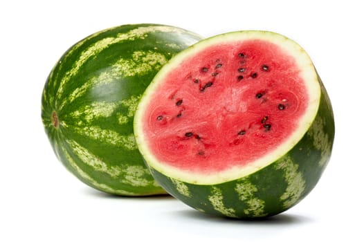Whole and a half of watermelon on white background