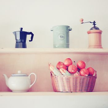 Tea and coffee equipment in kitchen with retro filter effect