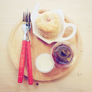 Homemade scone with strawberry jam