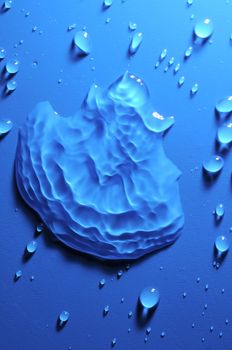 Some Water Drops on a Blue Textured Background