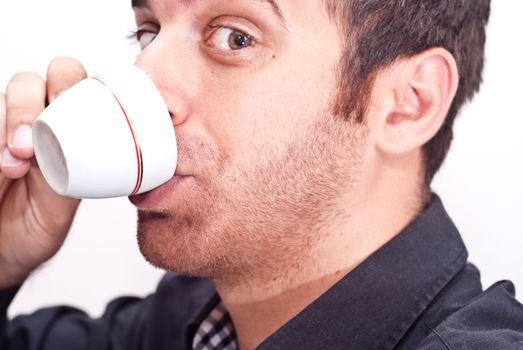 Close up portrait of a businessman drinking coffee isolatrd on white