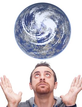 Man looks at the planet earth over him