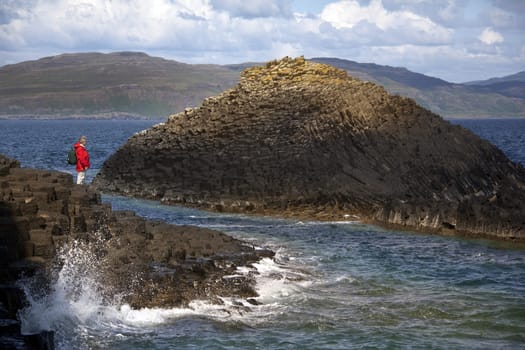 Basalt rock formation on the island of Staffa in the Treshnish Islands in the Inner Hebrides off the west coast of Scotland. (Model Released)