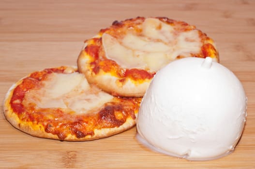 closeup of mini pizza with mozzarella