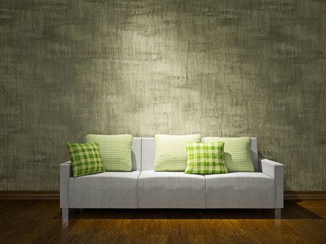 White sofa with pillows near the concrete wall