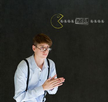 Business man with chalk pacman on blackboard background