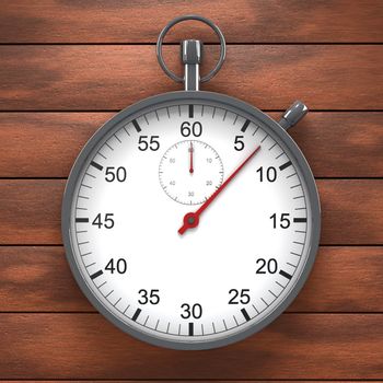 Stopwatch standing on a wood table