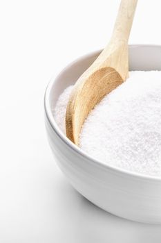 Spoon and bowl with sugar