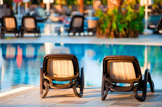 Chaise lounge by the pool to relax in the villa