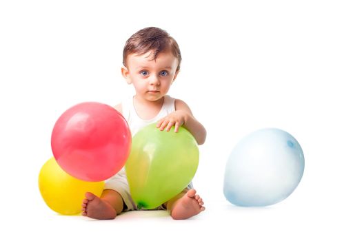 Baby with colorful balloons isolated on white background