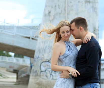 loving couple says goodbye to the river station