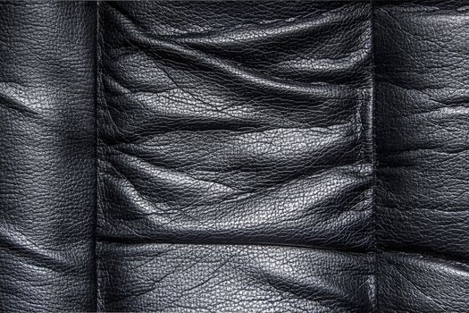 Closeup of black leather.