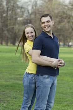 Portrait of love couple embracing outdoor