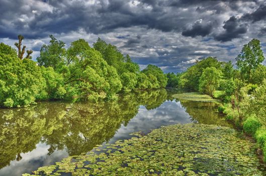 Fulda river in HDR Aueweiher Park  in Fulda, Hessen, Germany