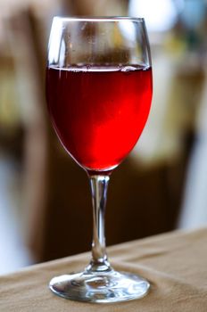 Glass of colorful fresh red cranberry juice close-up in the Restaurant, Sergiev Posad, Moscow region, Russia